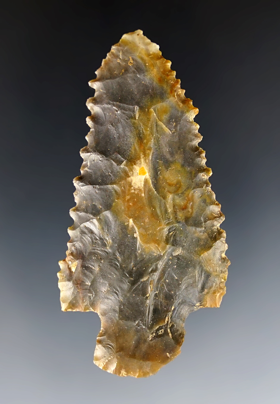 Finely serrated 2 5/8" Stemmed point found in Kentucky. Made from beautiful Sonora Flint.