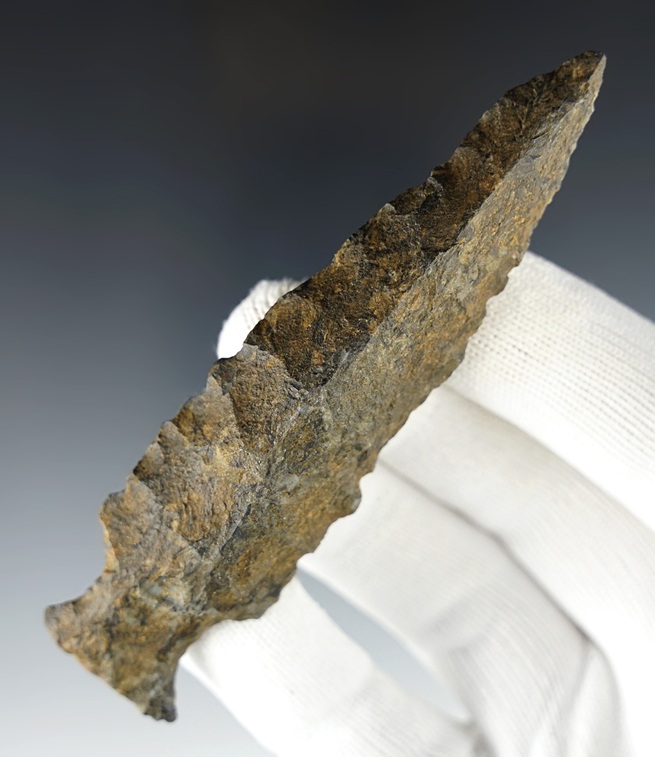 Large for the type: 4 1/8" Fishspear point with classic heavy basal grinding. Delaware Co., Ohio.