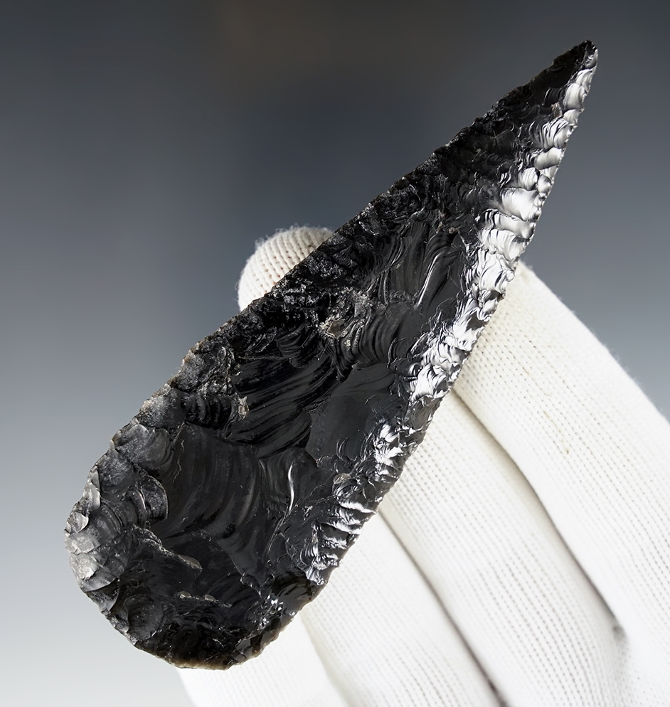 Incredible flaking on this 4 3/16" Obsidian Blade found in Modoc Co., California. Ex. George Miller.