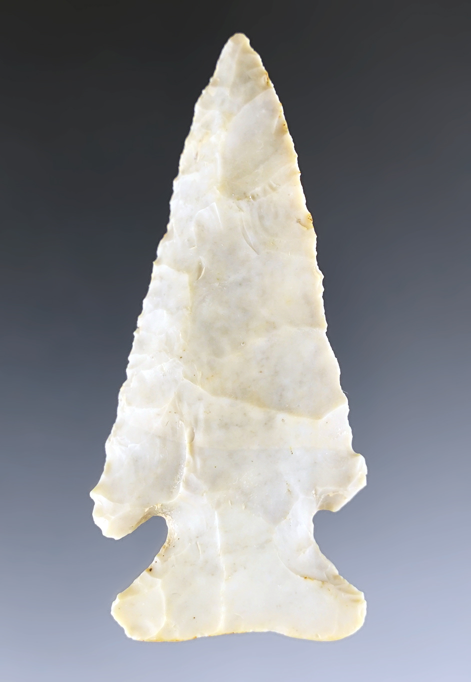 Steeply beveled 2 5/8" Archaic Thebes made from Flint Ridge Flint. Found in Hocking Co., Ohio.