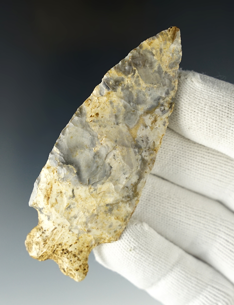 3 3/8" Bifurcated point made from Mozarkite. Found in Cole Co., Missouri. COA.