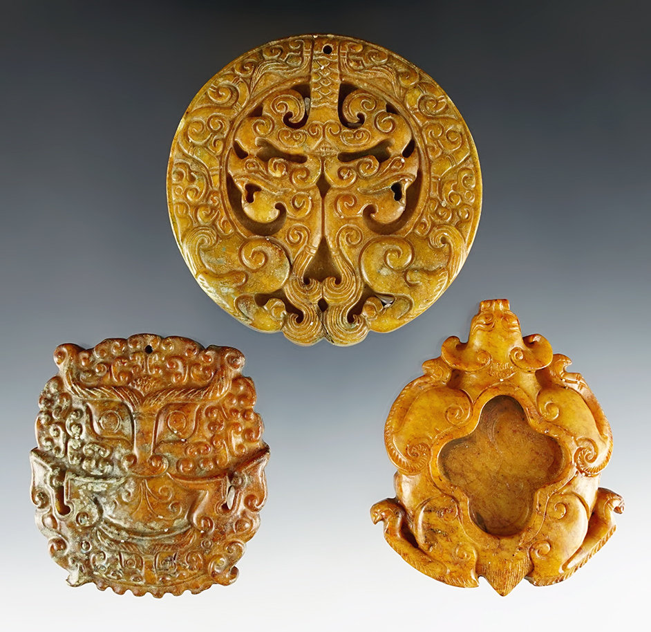Set of three contemporary Jade Carvings. The largest is 3" in diameter.