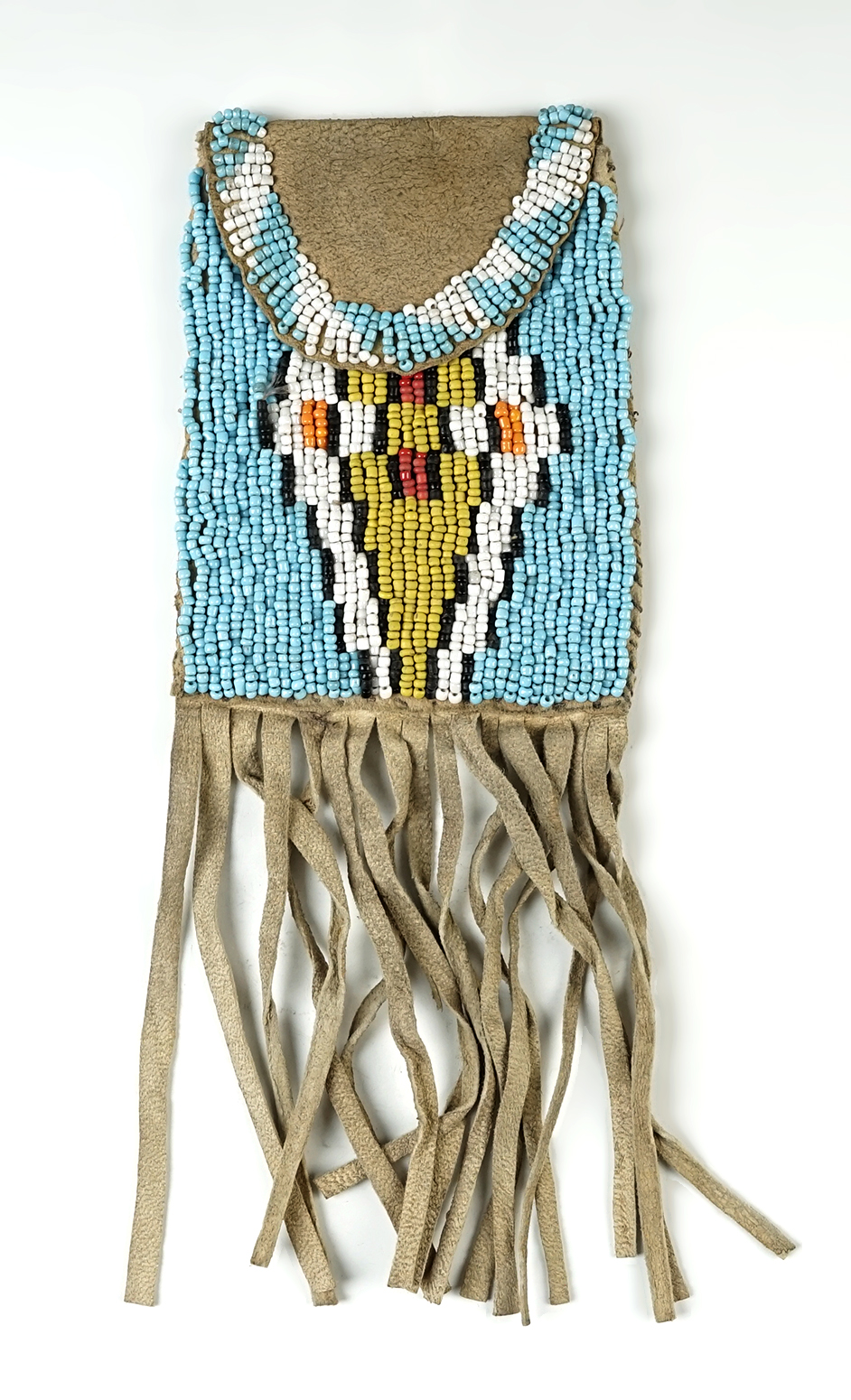 9" overall length vintage Cheyenne fringed and Beaded Pouch. In nice condition for age.