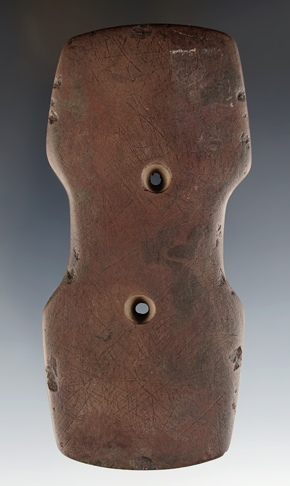 4 1/8" Indented Ohio Gorget made of reddish brown Slate. Pictured in Ohio Arch., Volume 67.