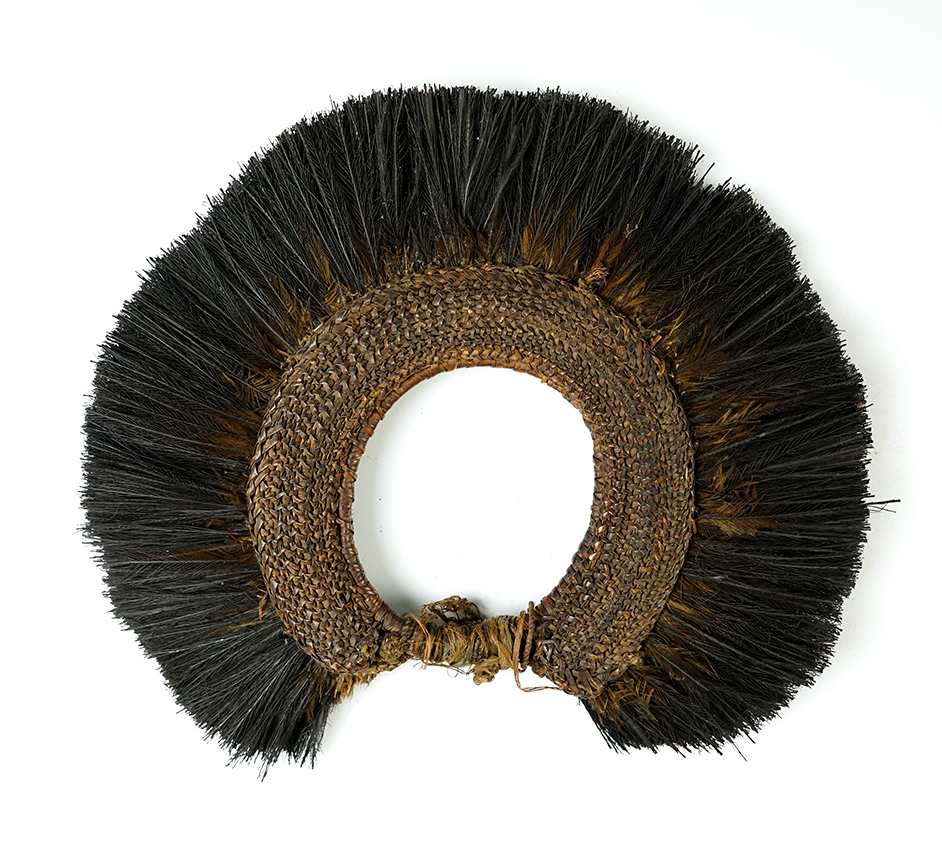 9" x 8" vintage African or Island Culture Personal Adornment. Very nicely woven with feathers.