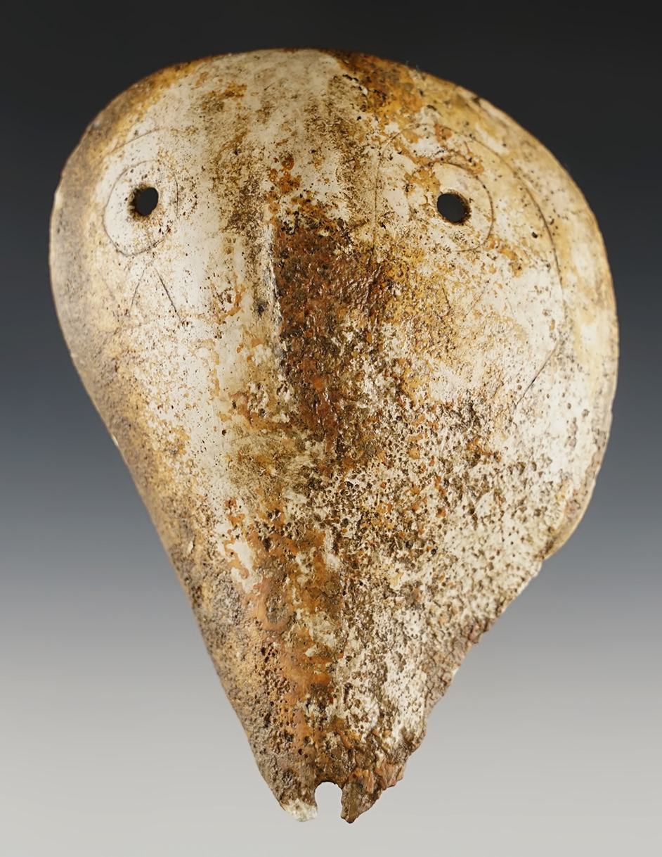 4 1/2" x 3 3/8" Shell Mask engraved with "weeping eye." Big Eddy Site, St. Francis Co., Arkansas.