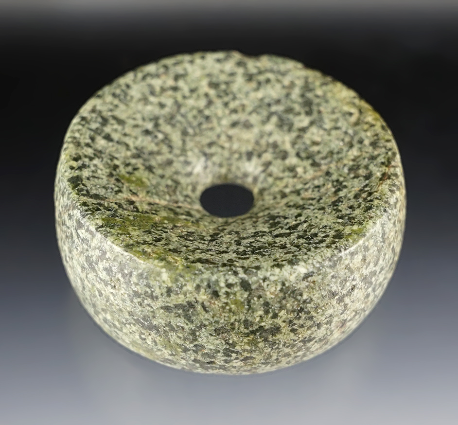 2" diameter speckled green Hardstone Discoidal. Found in Illinois.