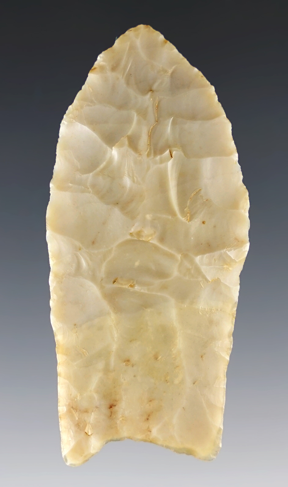 2 1/2" Flint Ridge Chalcedony Paleo Clovis. Fluted on both sides. Found in Ohio.