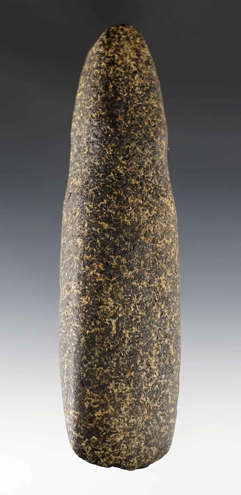 5 5/8" Hardstone Celt that is grooved around the upper area. Found in Portage Co., Ohio.