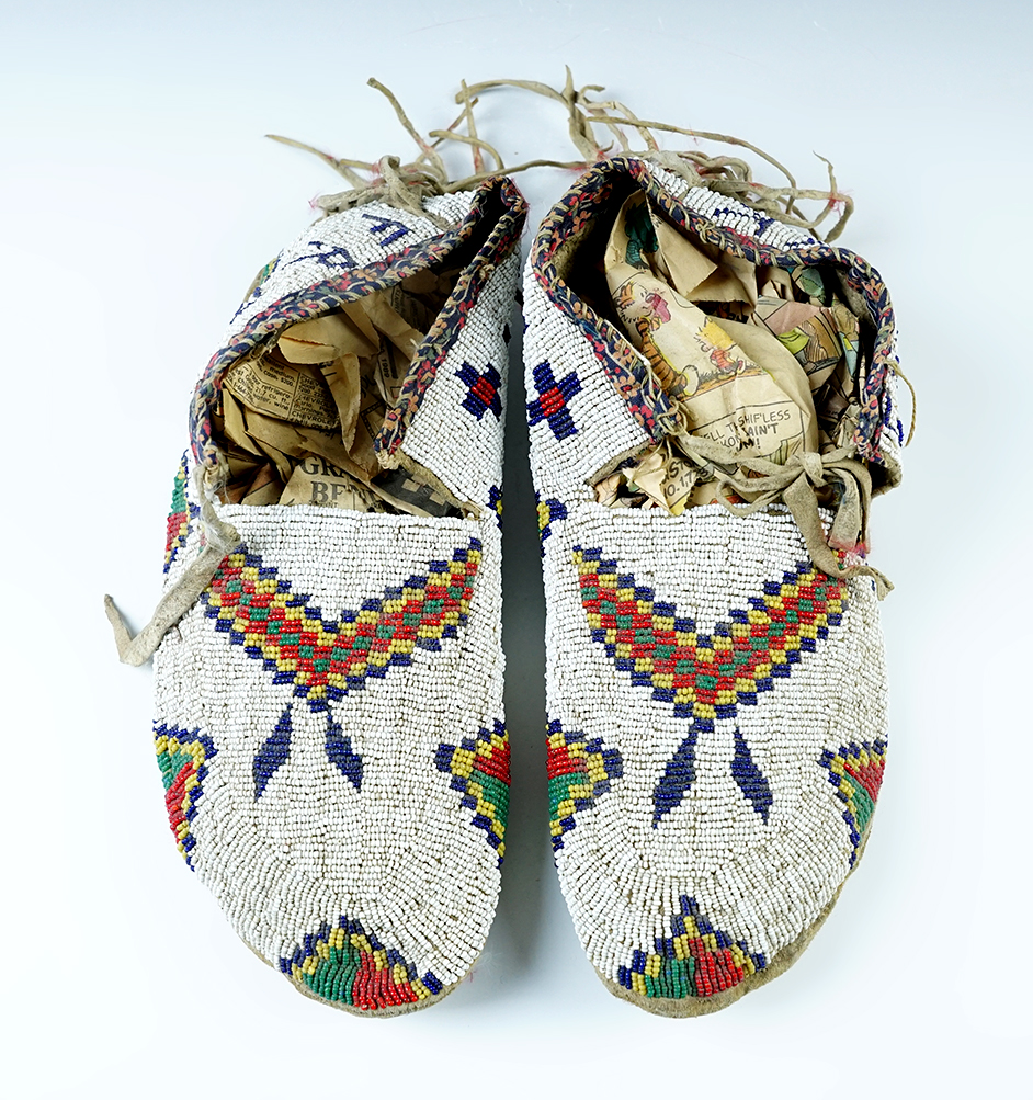 Early 1900's pair of beaded Leather Moccasins that are 10 1/2" long.
