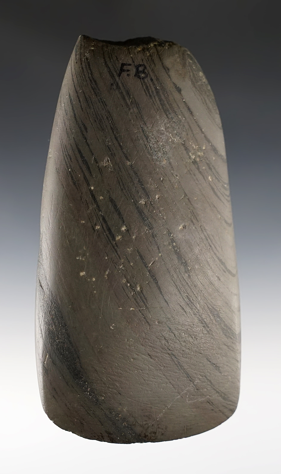 5 1/2" long Ohio Celt made from Banded Slate. Rare material for this type of artifact.