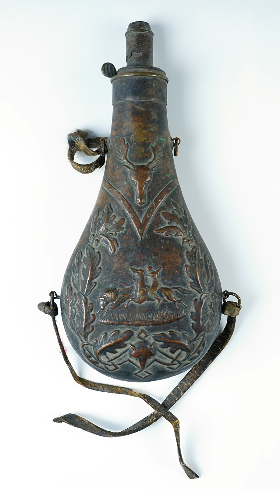 9 1/2" long ornately decorated Copper Flask for black powder gun.