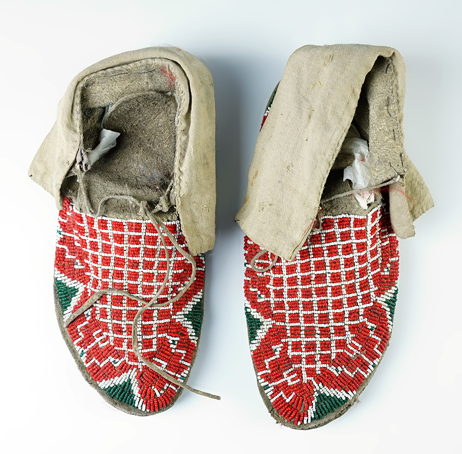 9 1/2" long ornately beaded Leather Moccasins from the late 1800's.