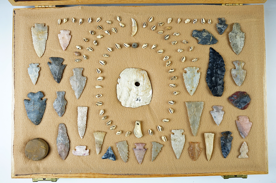 Group of artifacts recovered in Adams Co., Ohio. Shell beads, points, knives and tools.