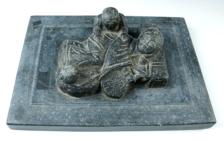 11 1/2" x 8" Tang Dynasty Stone Shoe Press that is ornately carved.