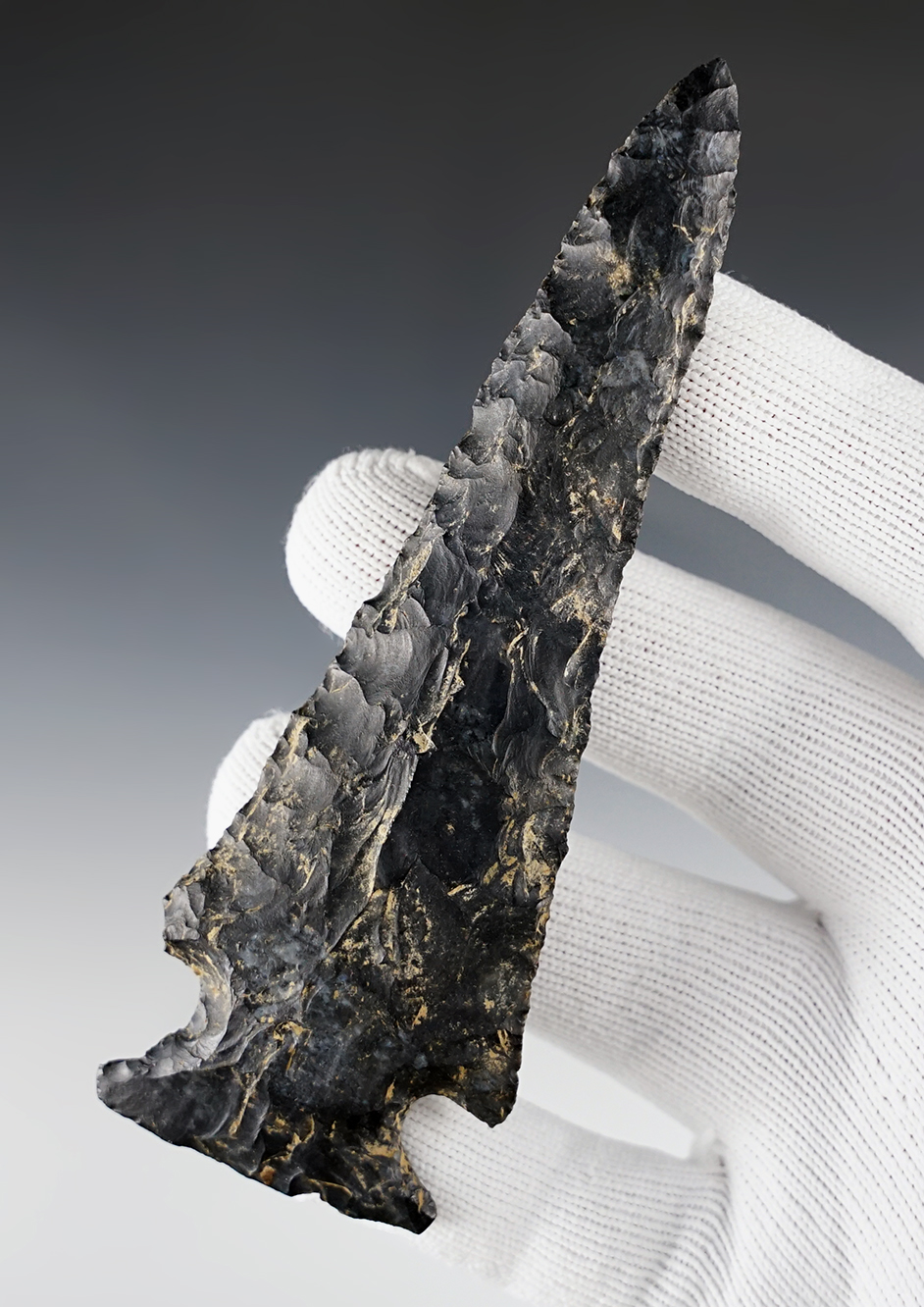 4 11/16" Archaic Cornernotch made from Coshocton Flint. Found in Delaware Co., Ohio.