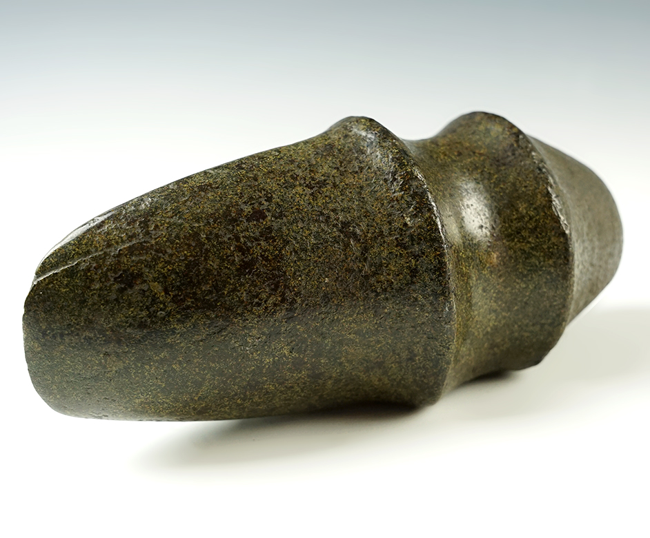7" long 3/4 Illinois Groove Axe that has a clear substance applied to the surface.