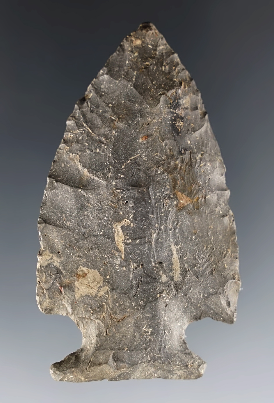 2 5/16" Archaic Ohio Cornernotch made from Nellie Chert. Nice ancient grinding to the base.