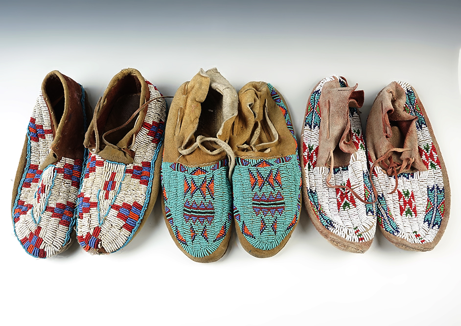 Three pairs of contemporary beaded Moccasins from the mid to later 1900's.