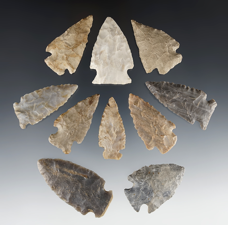 Set of 10 Midwest Archaic-type points made from assorted materials. The largest is 2 1/4".