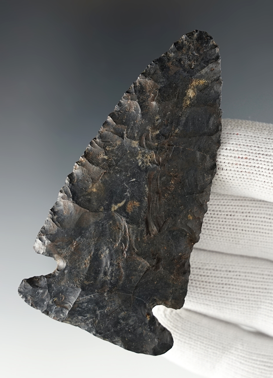 3 1/4" Archaic Cornernotch with excellent heavy ancient basal grinding. Found in Ohio.