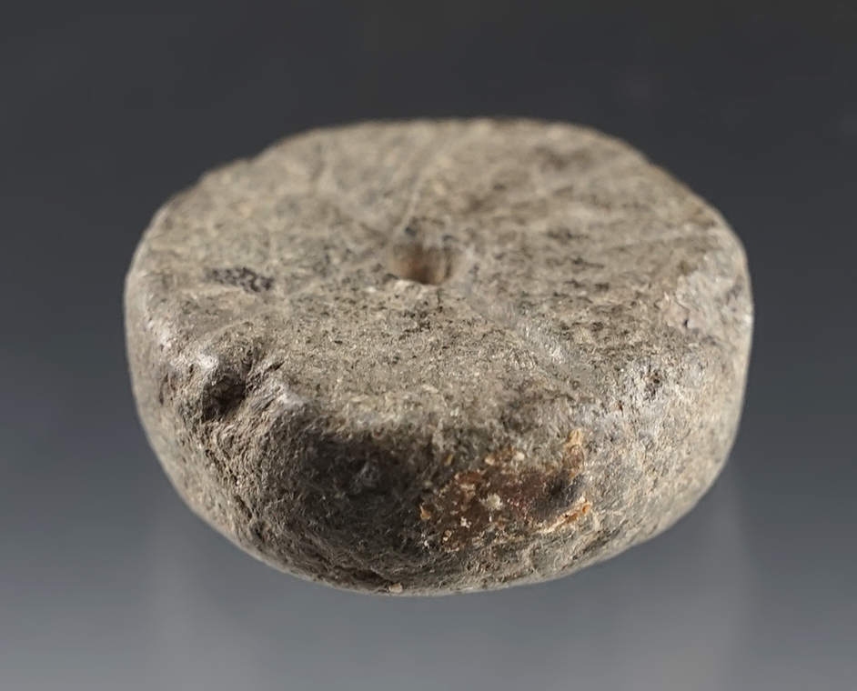 1 1/4" diameter Ft. Ancient Gamestone that is engraved on both sides. Found in Southern Ohio.