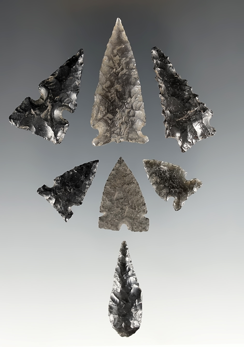Set of 7 Points found in the Western U.S. Made from Obsidian. The largest is 1 5/8".