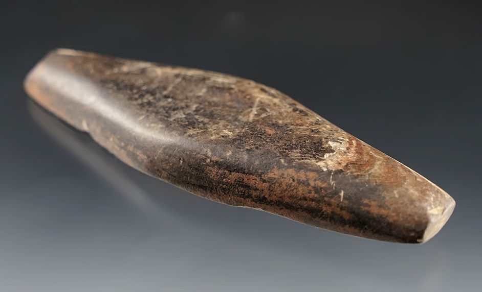 4 1/2" undrilled Expanded Center Gorget that is heavily patinated. Found in Indiana.