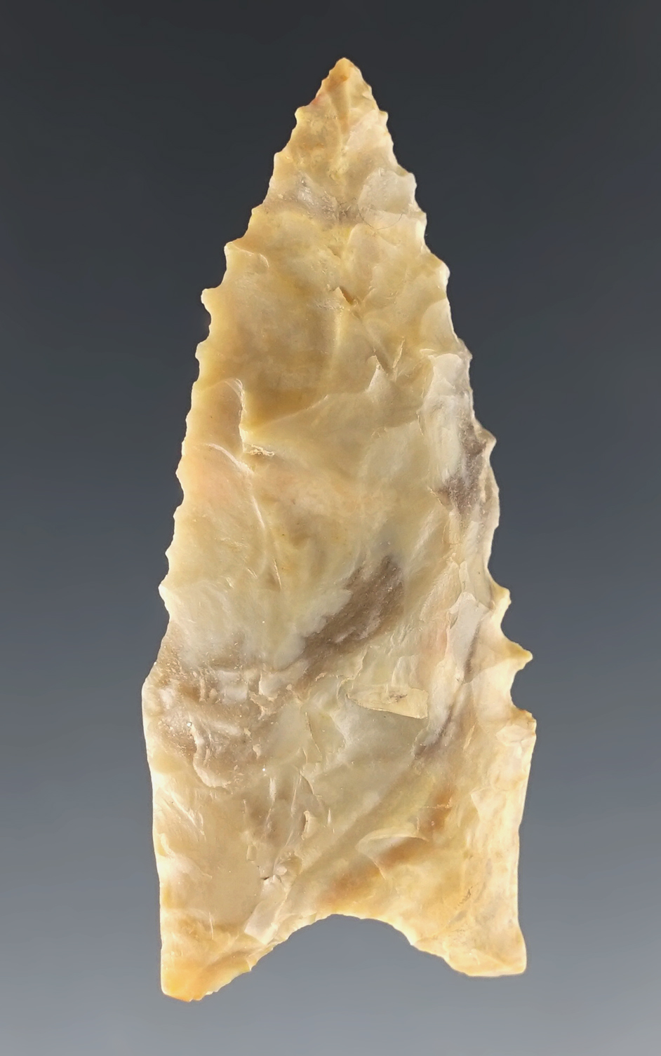 2 1/16" Serrated Dalton made from nicely colored chert. Found in Arkansas.