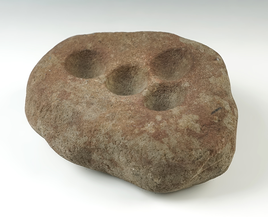 Nice 7" wide Ohio Nutting Stone with 4 divots on the top.