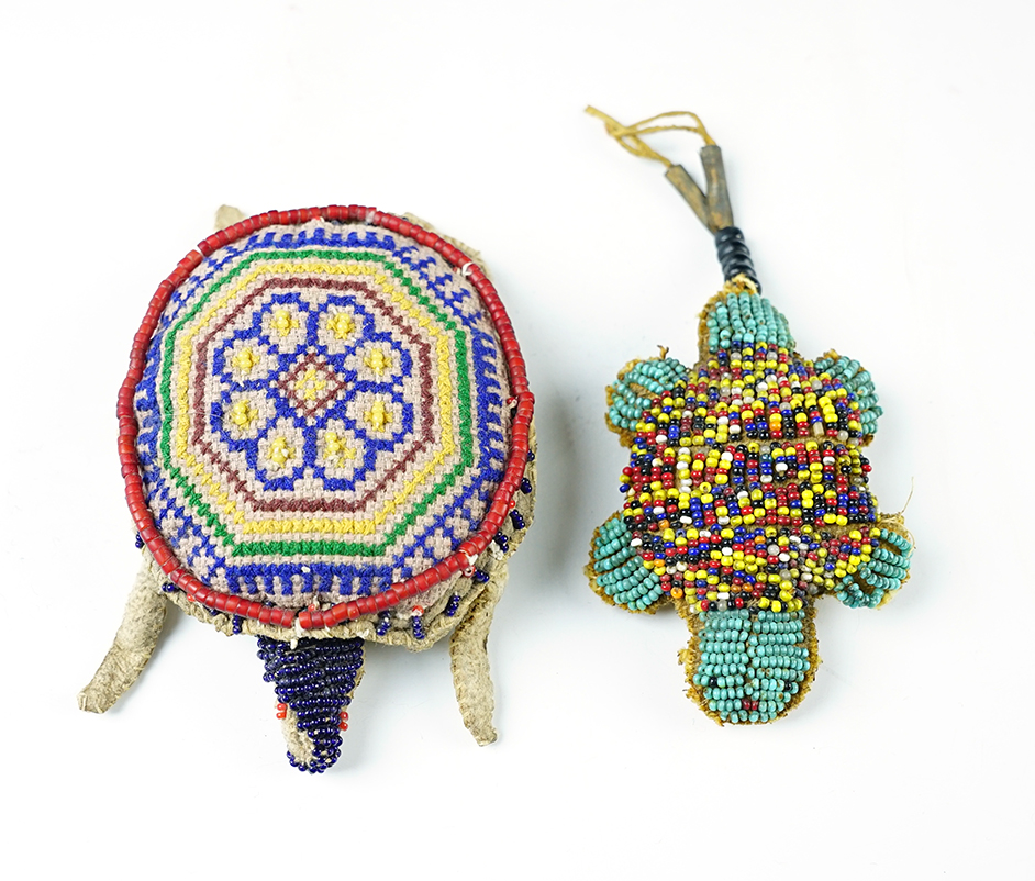 Pair of Vintage Fetishes made from beaded leather, largest is 4 1/4".