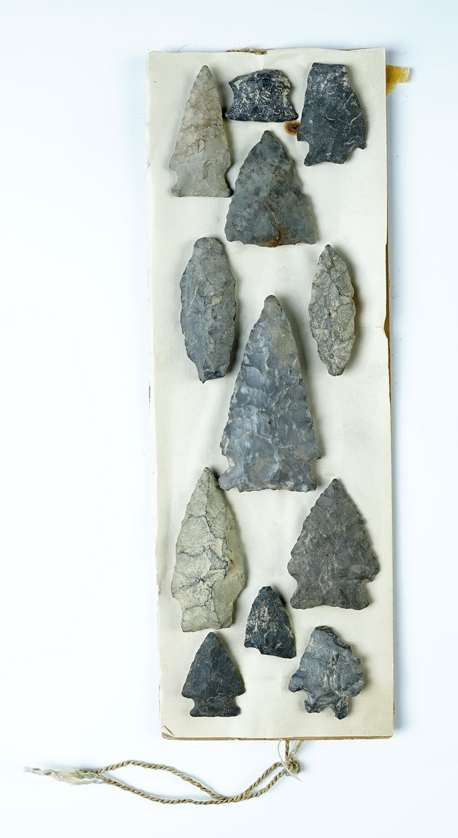 Old collector card with 12 Flint artifacts glued on, largest is a Meadowood. Shamokin PA