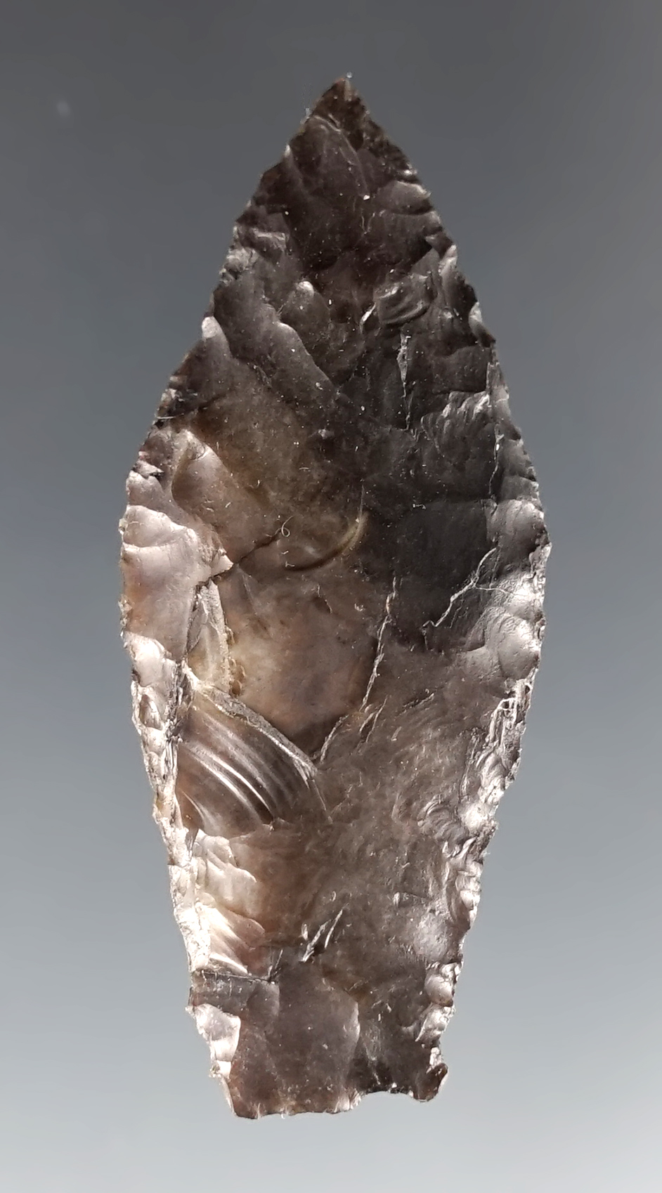 1 7/8" Humboldt with nice flaking. Made from dark-colored Jasper. Columbia River, Oregon.