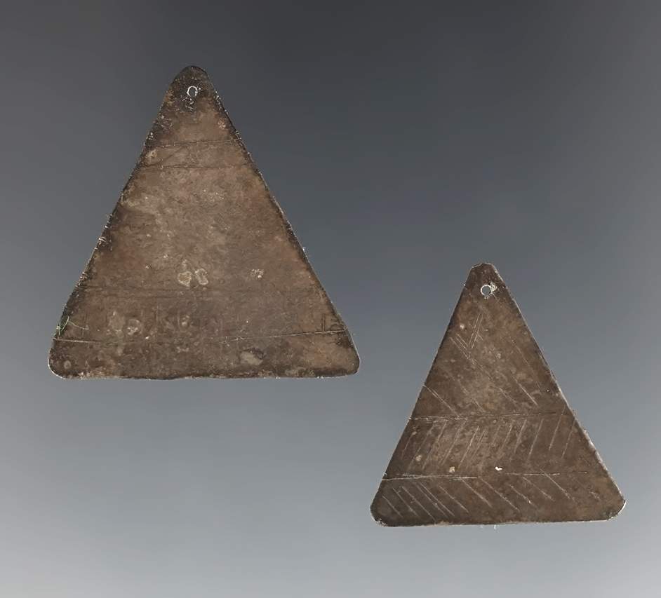 Pair of highly engraved Trade Silver Earrings recovered in New York. The larger is 1 1/16".