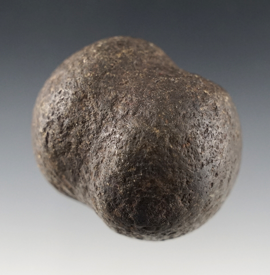 1 5/8" miniature Grooved Club Head found in Peru. Made from patinated Hardstone.