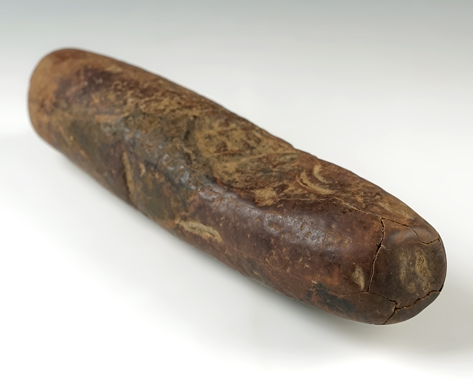 9 1/4" Roller Pestle made from Limonite found in the Midwest. A few loose surface flakes.