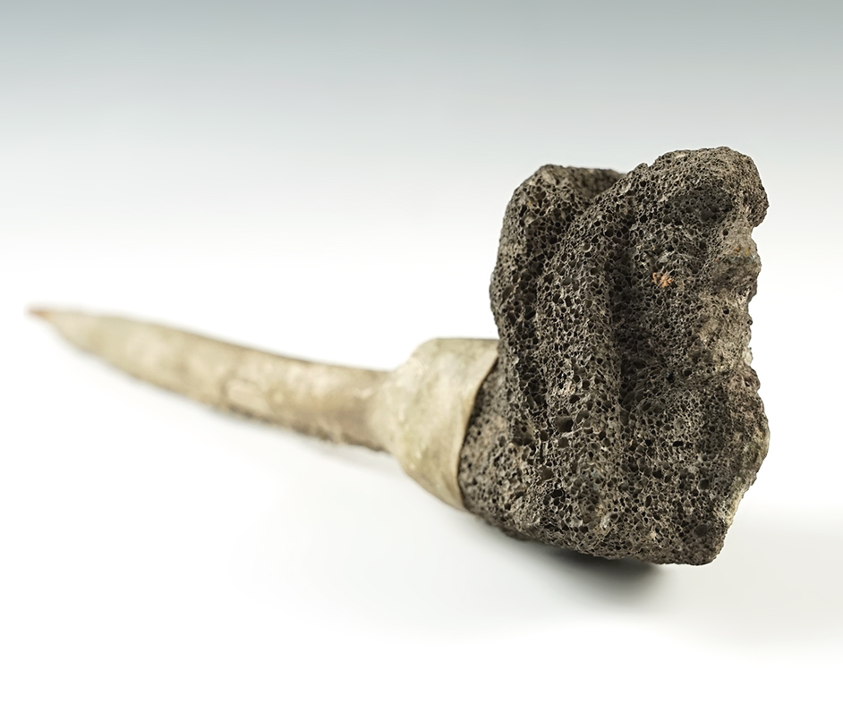Vintage 12 1/2" long by 2 3/4" tall Lava Stone Pipe with a motif of a human carrying a basket.